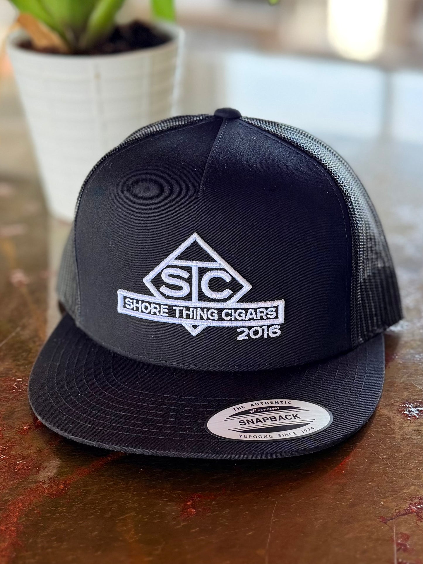 Black STC Hat 10 year Edition